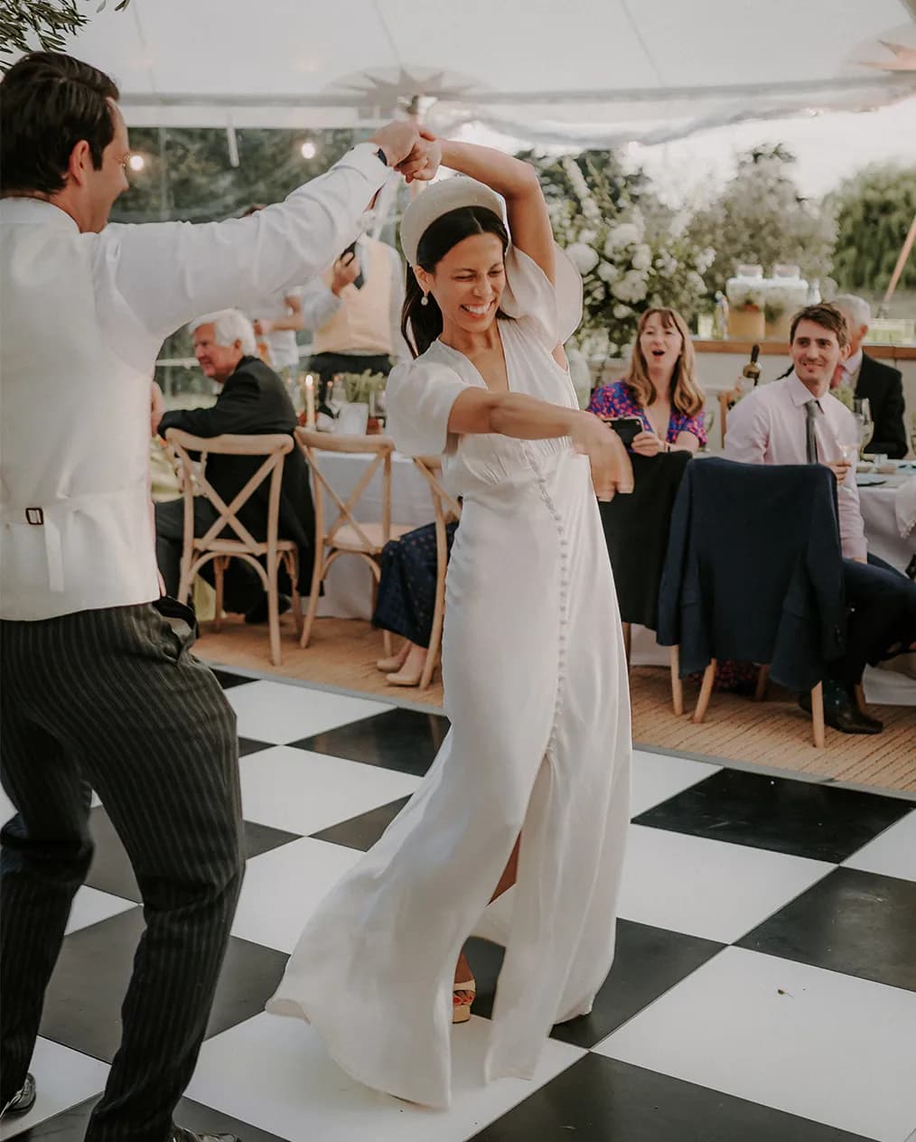 bride and groom dancing and having fun wedding party