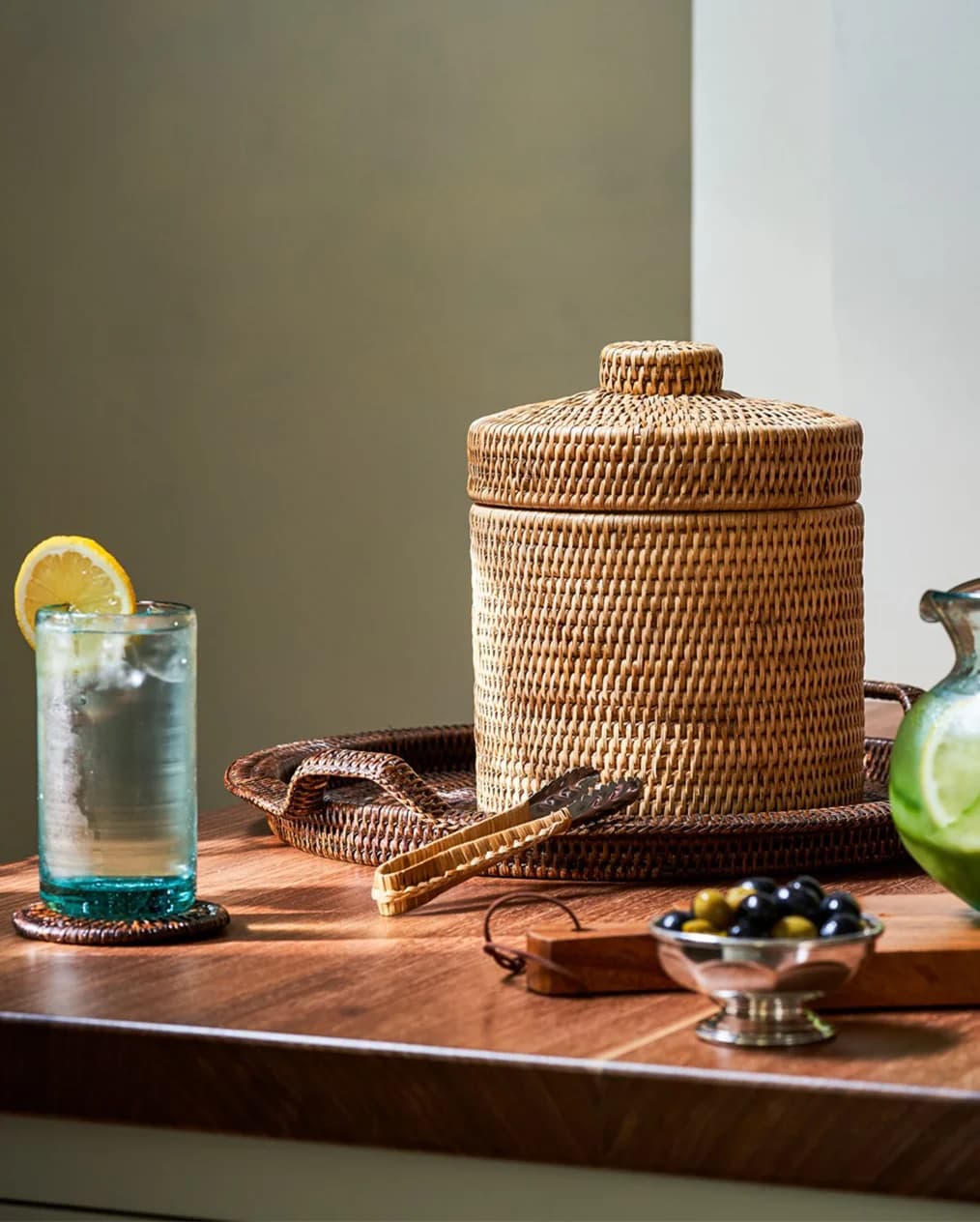 Making cocktails with Kalinko rattan ice bucket